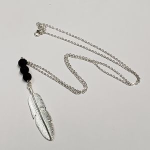 Aromatherapy feather lava bead statement necklace